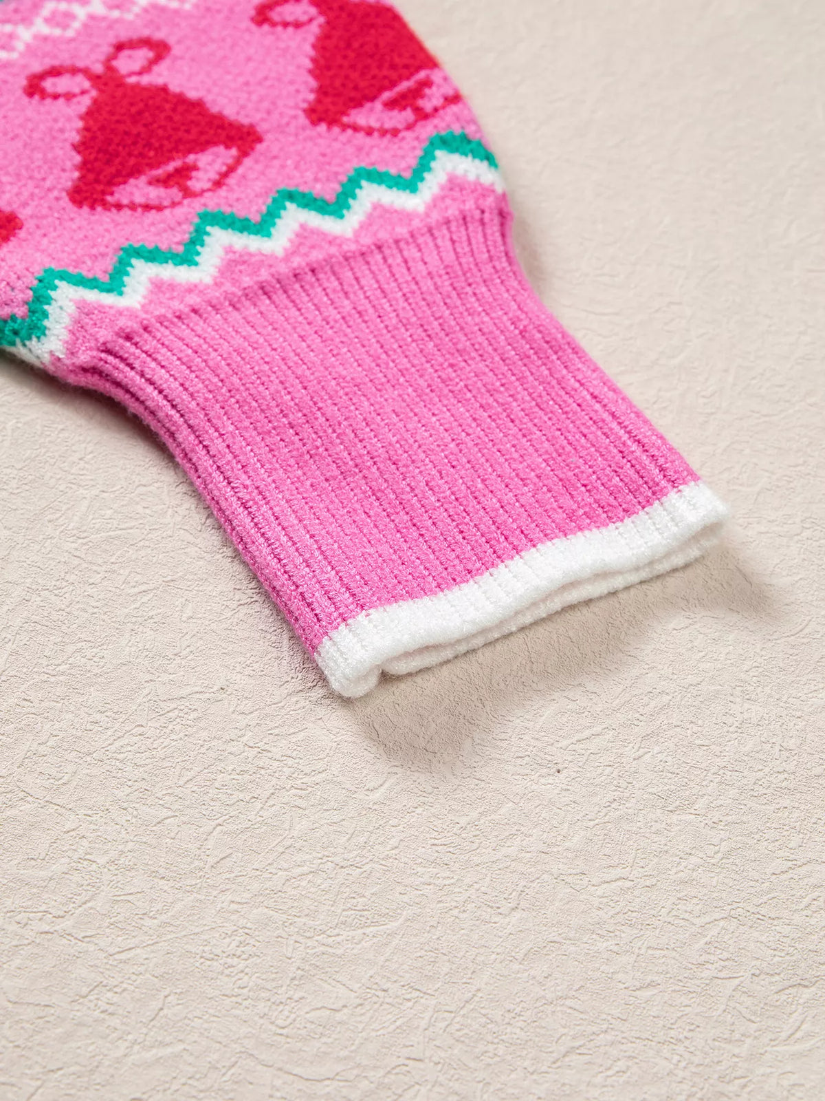 Pink Christmas graphic sweater, ribbed cuff detail