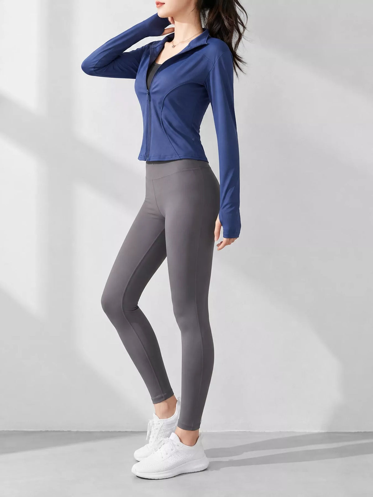 Navy quick-dry zip-up jacket, side view