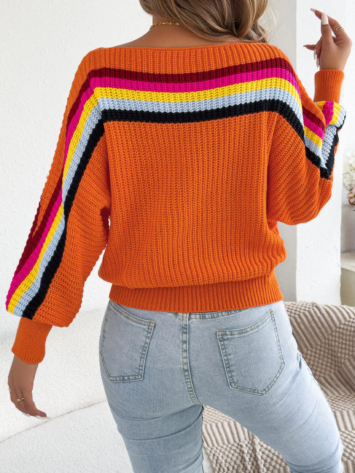 Striped Knit Boat Neck Sweater in orange, back view