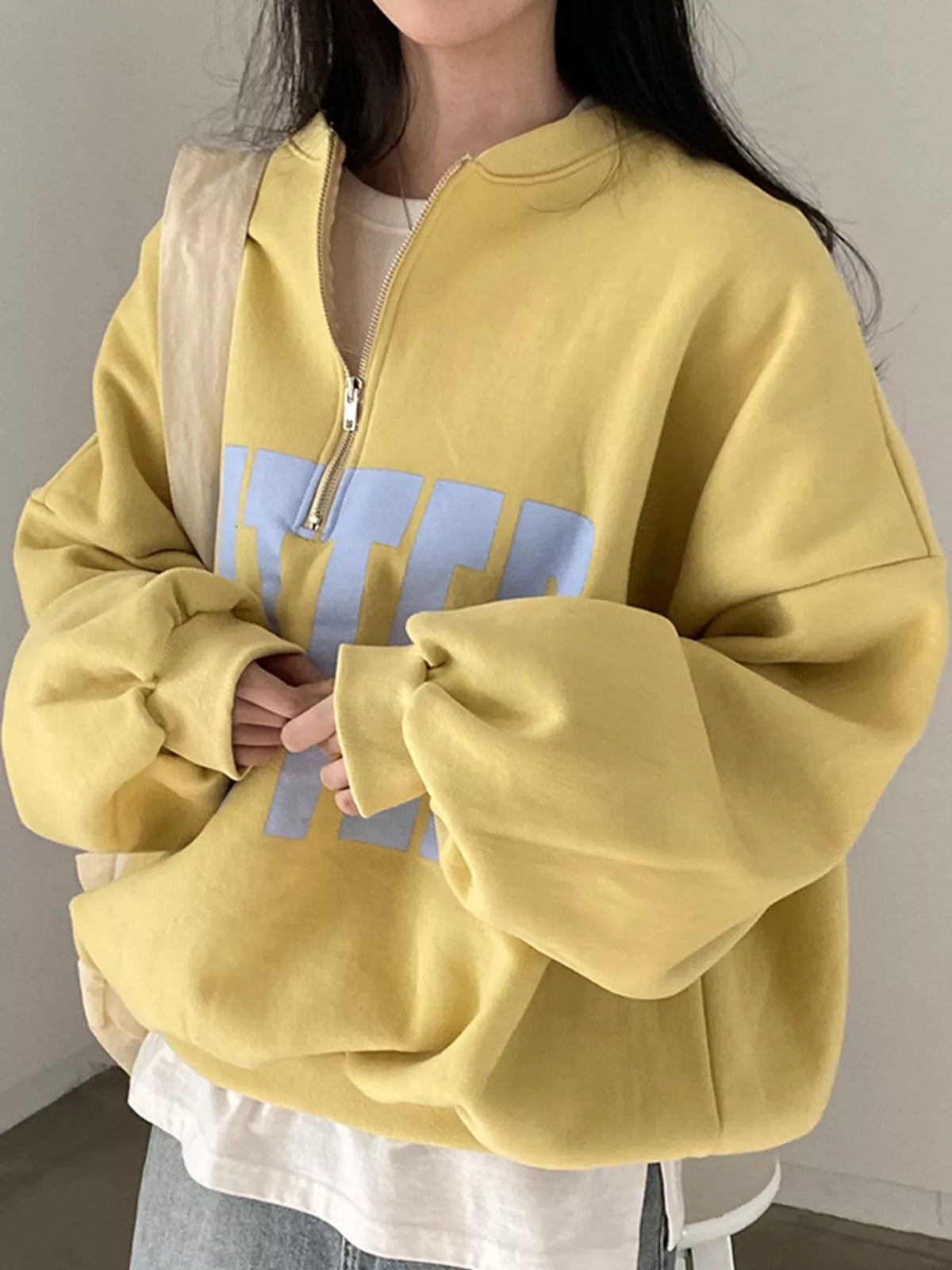 Women's Half-Zip Letter Graphic Sweatshirt in yellow — front view