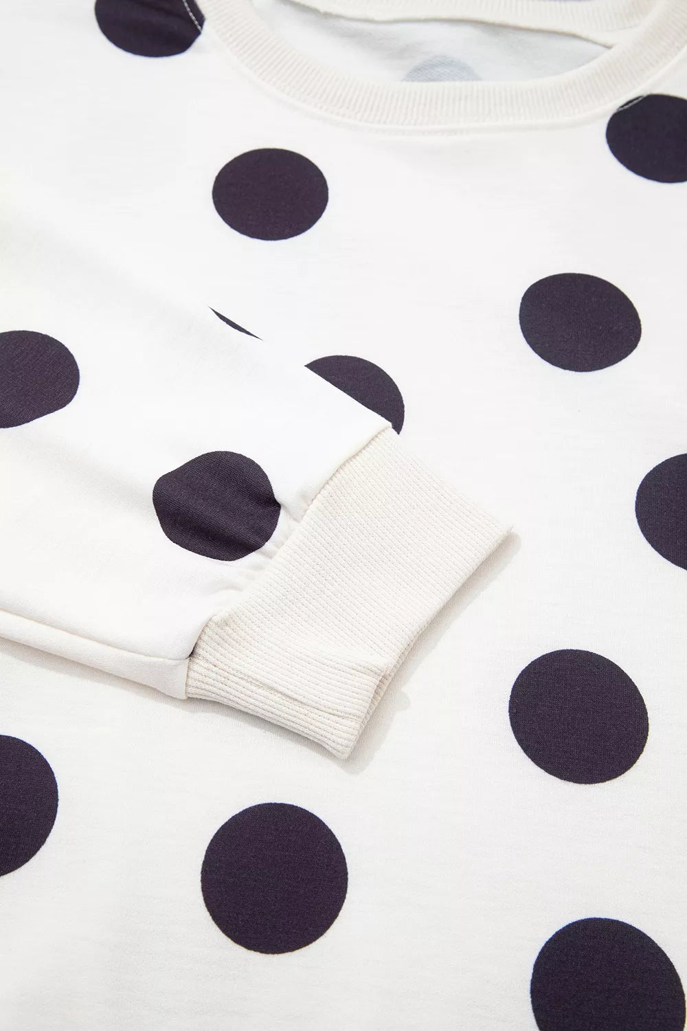 White polka dot round neck sweatshirt