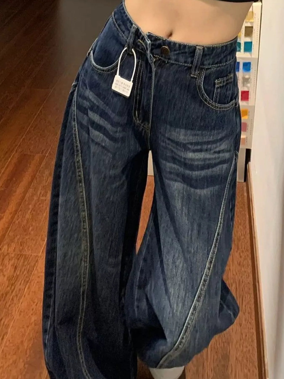 High-Waisted Wide-Leg Asymmetric Seam Vintage Wash Jeans — front view