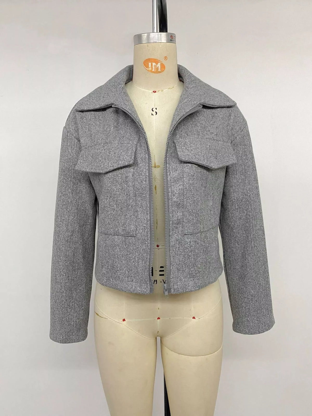 Gray zip-up cropped shacket, open front on mannequin