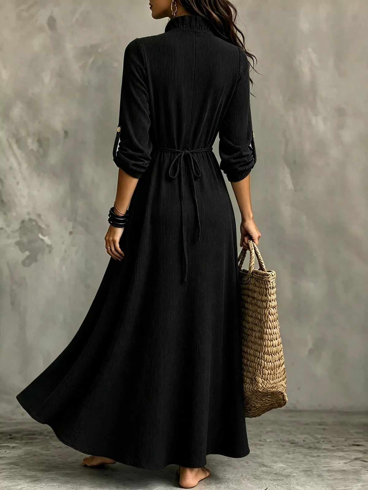 Black V-neck maxi dress, back view