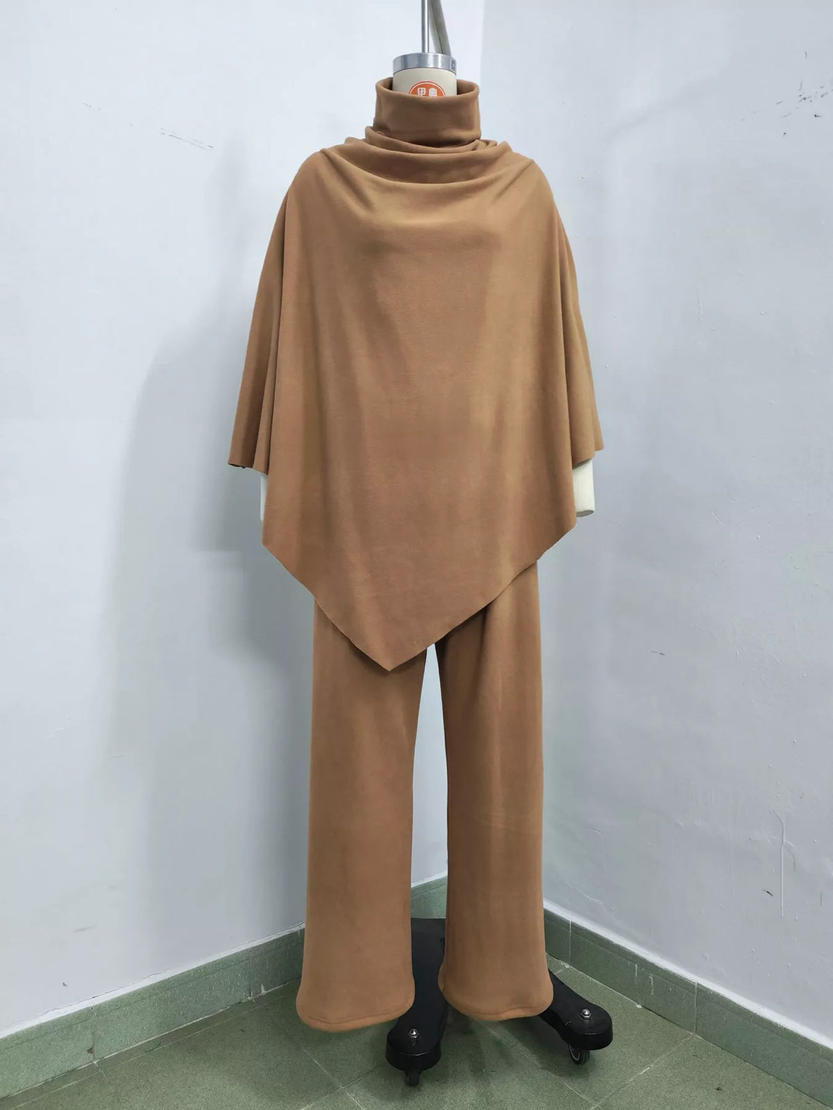 Poncho and pants set, camel mannequin front