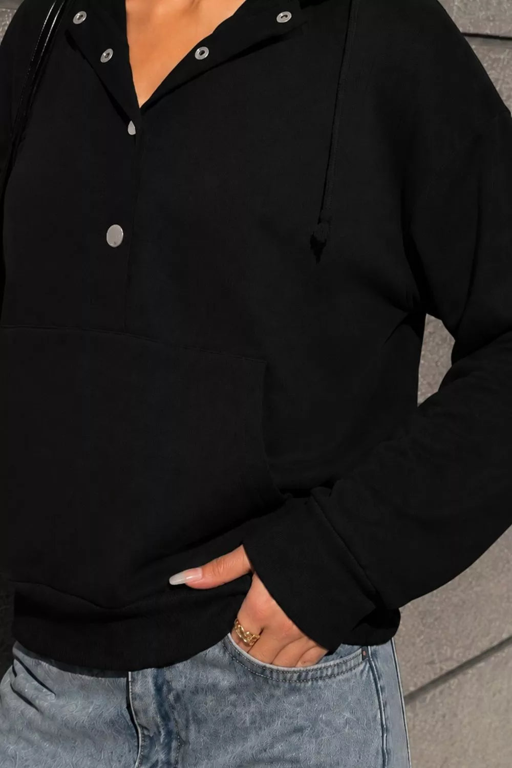 Women's Half Snap Kangaroo Pocket Hoodie in Black, side view