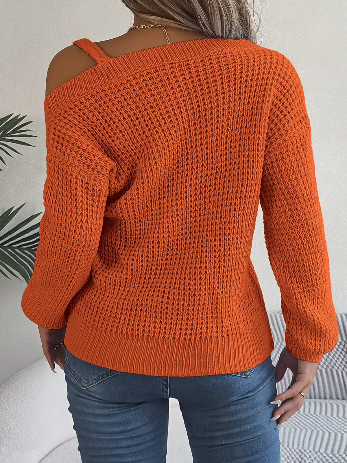 Asymmetrical Neck Long Sleeve Sweater in orange, back view