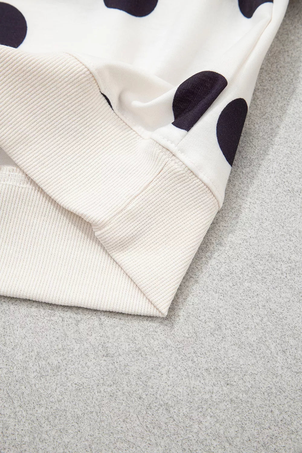 White polka dot round neck sweatshirt