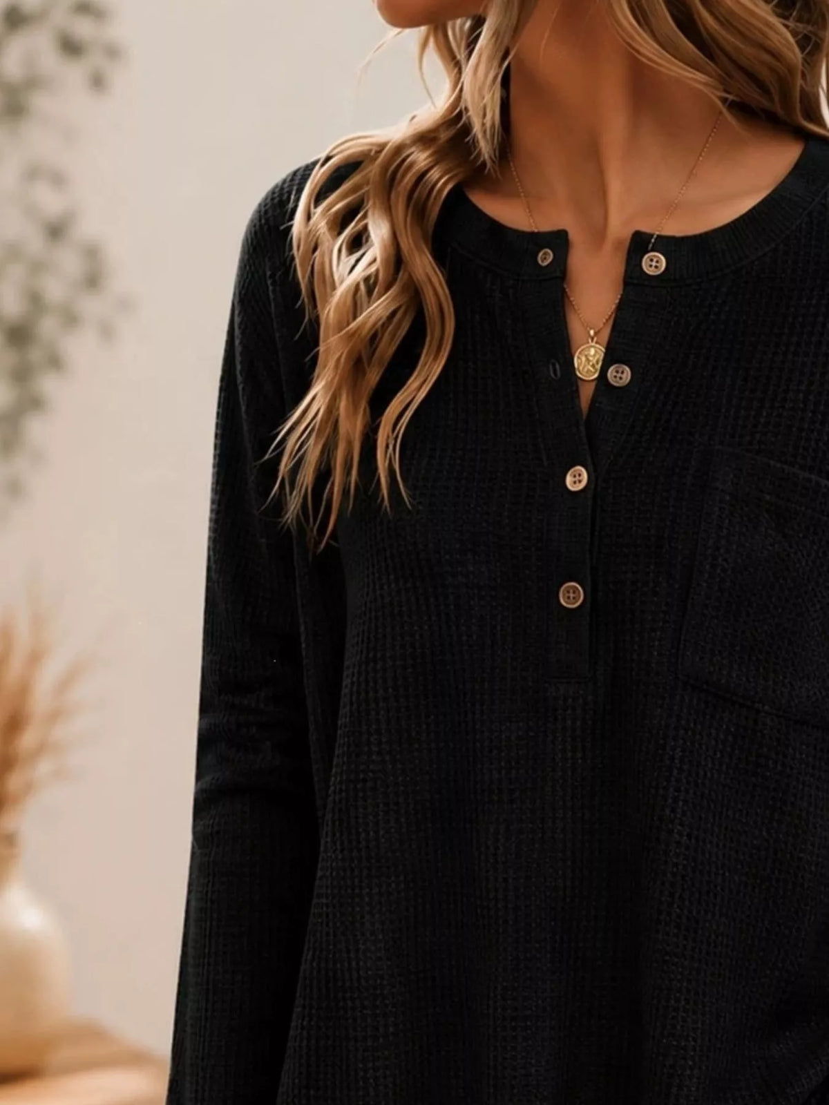 Black waffle-knit button-detail top, button neckline detail