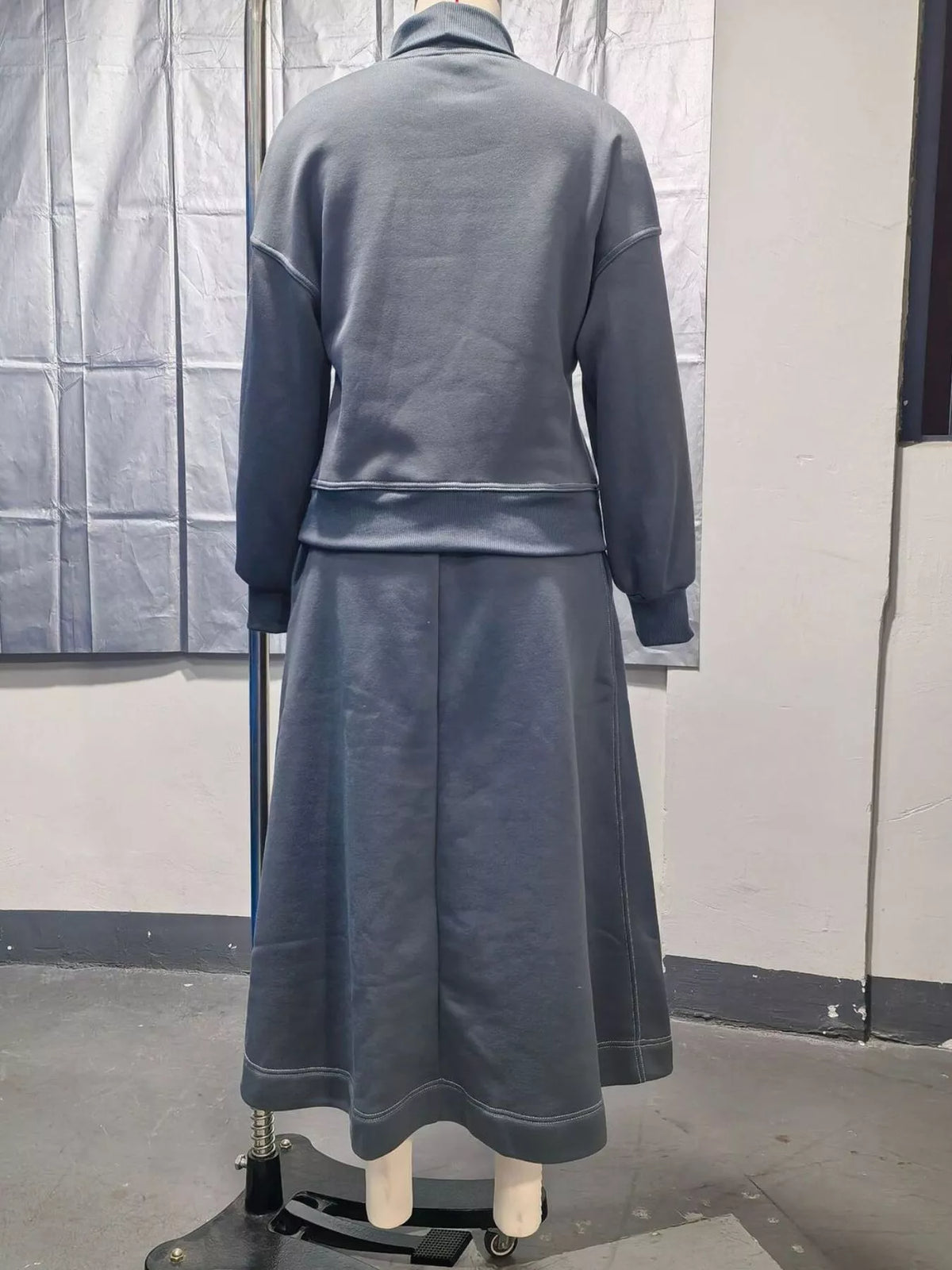 Sweater and skirt set, gray mannequin back