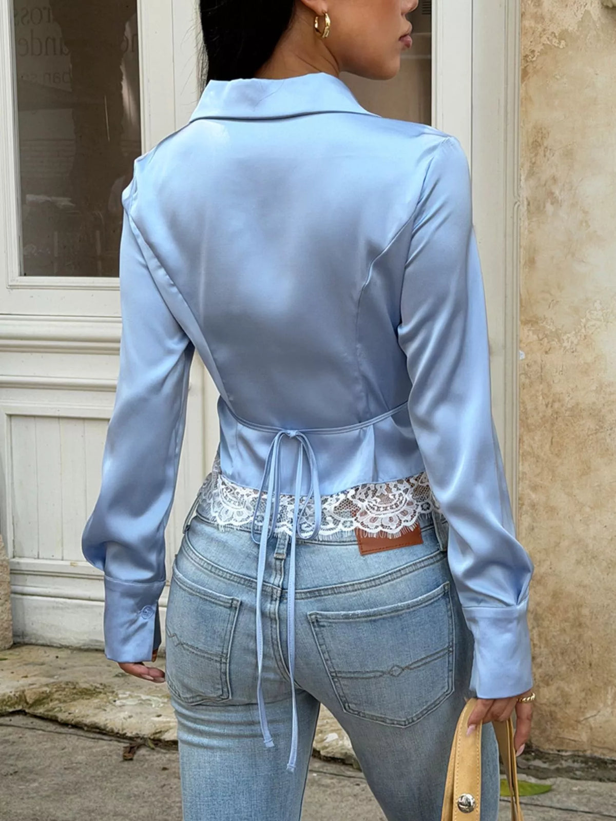 Light blue lace-hem button-up shirt, back view with waist tie