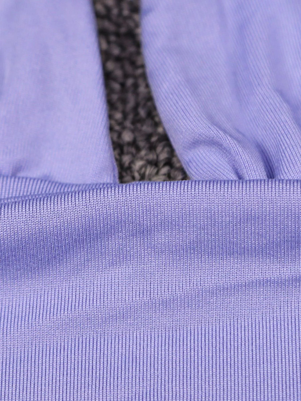 Purple halter crop top and ruched bodycon mini skirt set, close-up of halter straps and upper seam