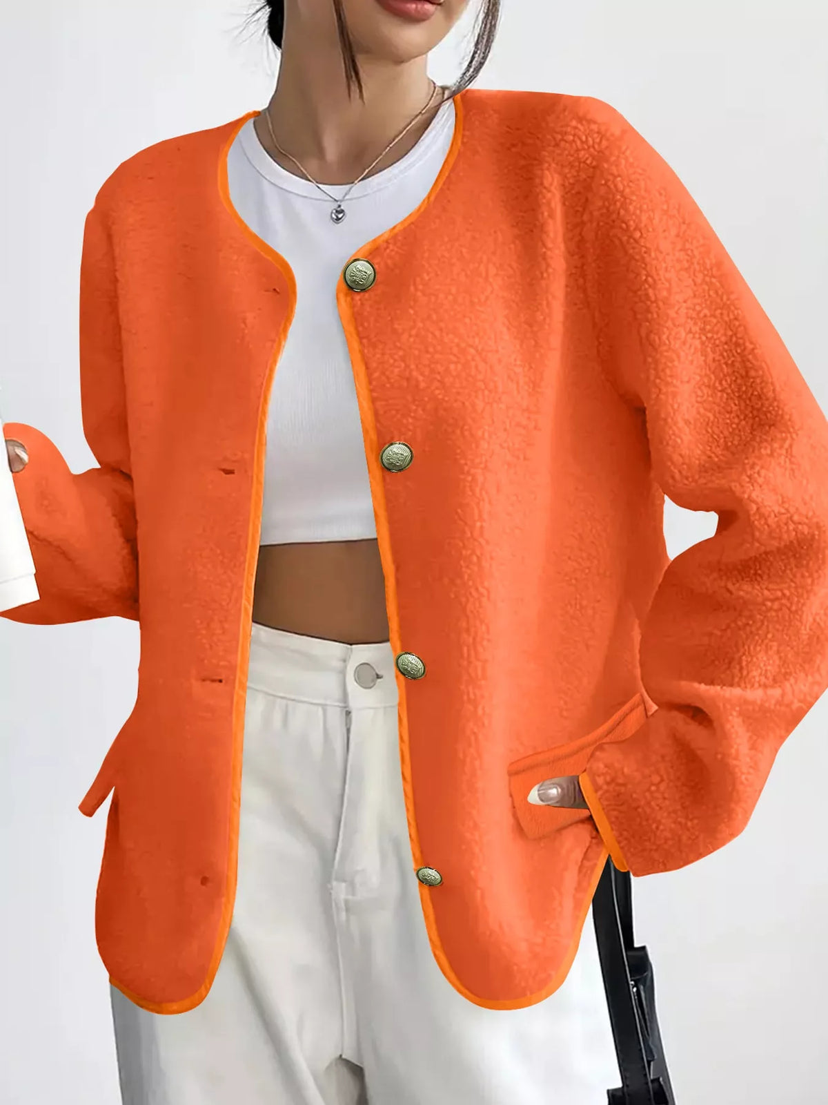 Orange textured button-front jacket — front view
