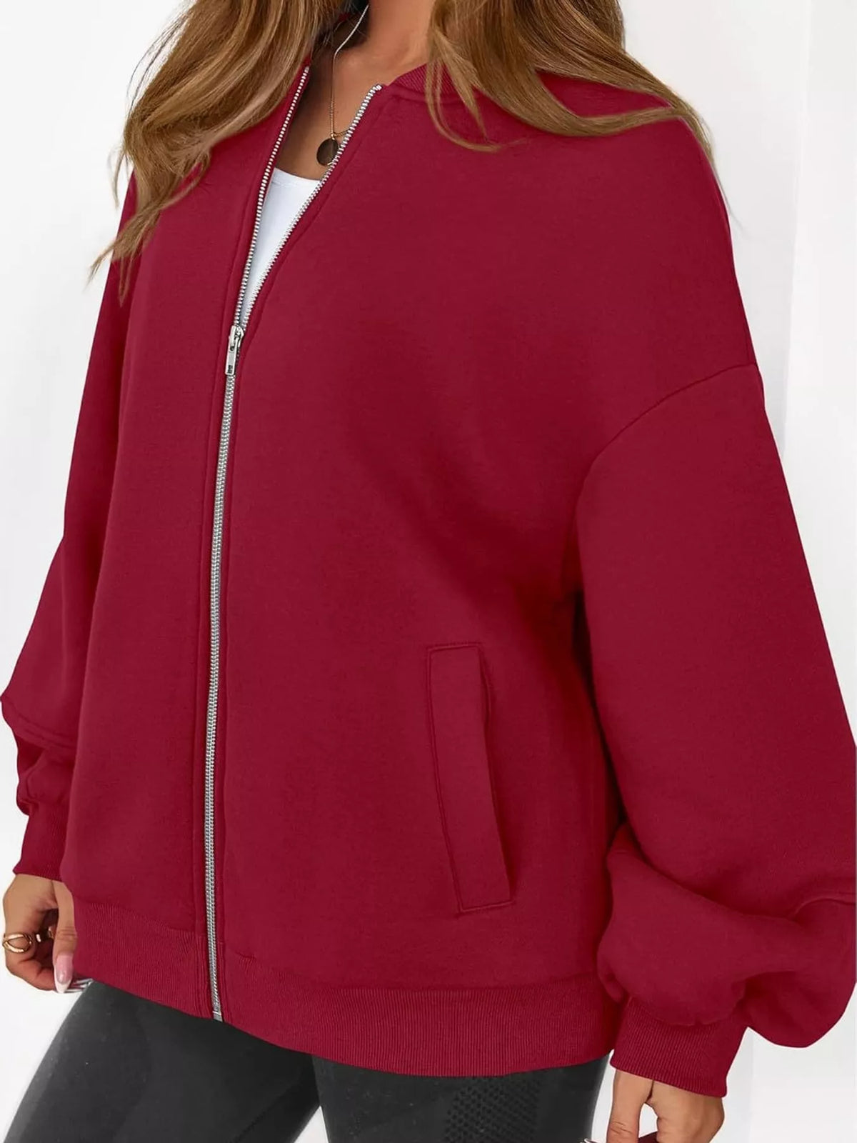 Red oversized zip-up jacket — front view