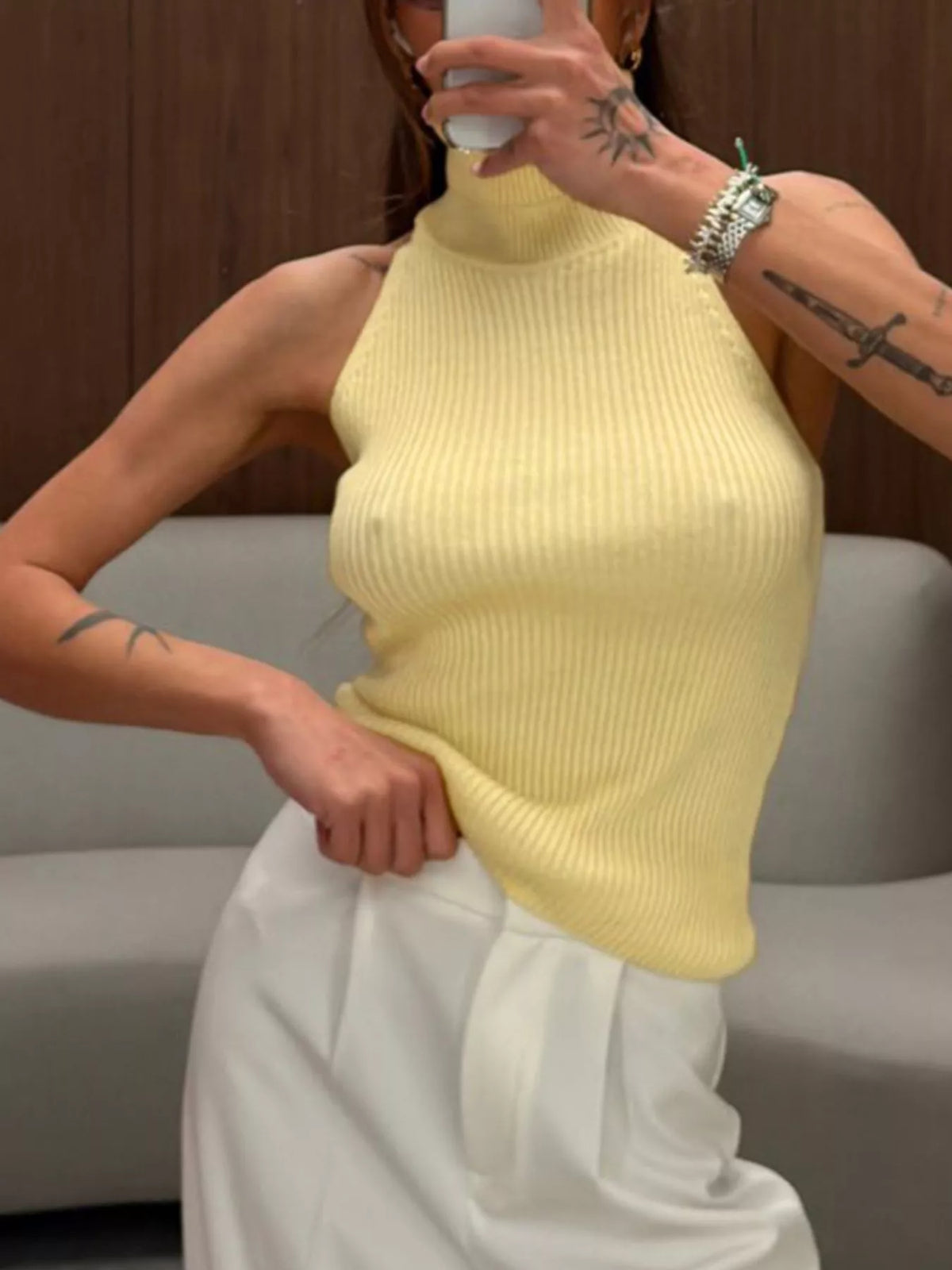 Yellow ribbed halter-neck tank, front mirror view