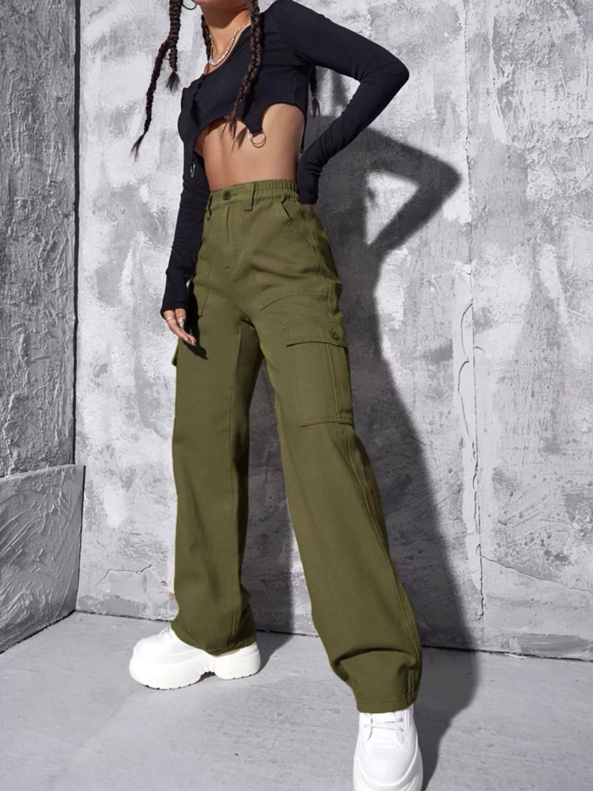 Olive green wide-leg cargo jeans, side view