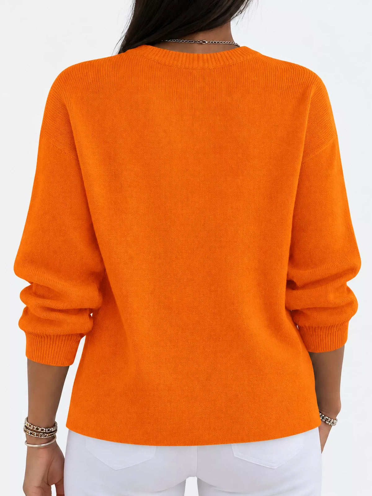 Orange crew neck sweater, back view