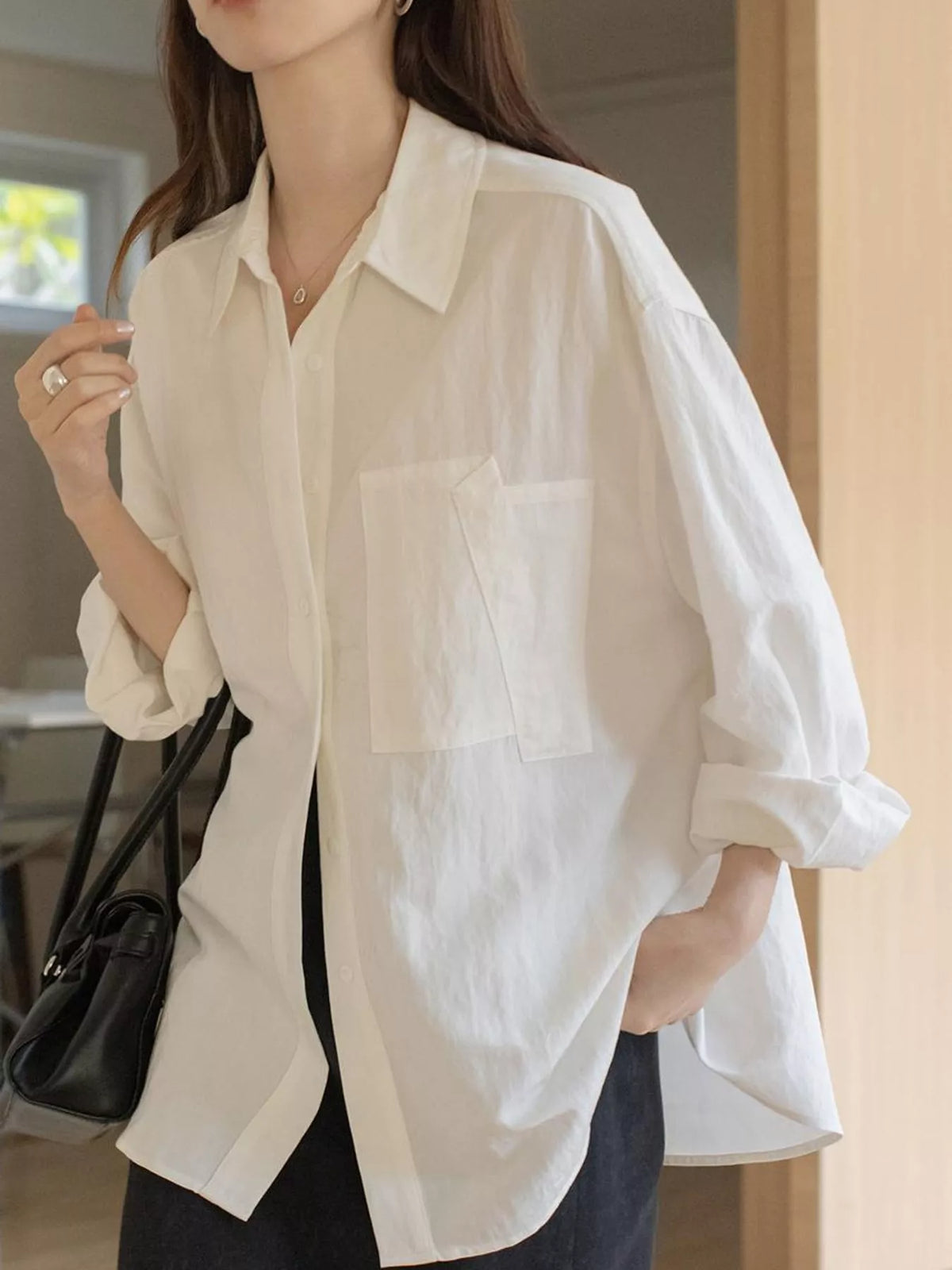 White button down long sleeve shirt, front view