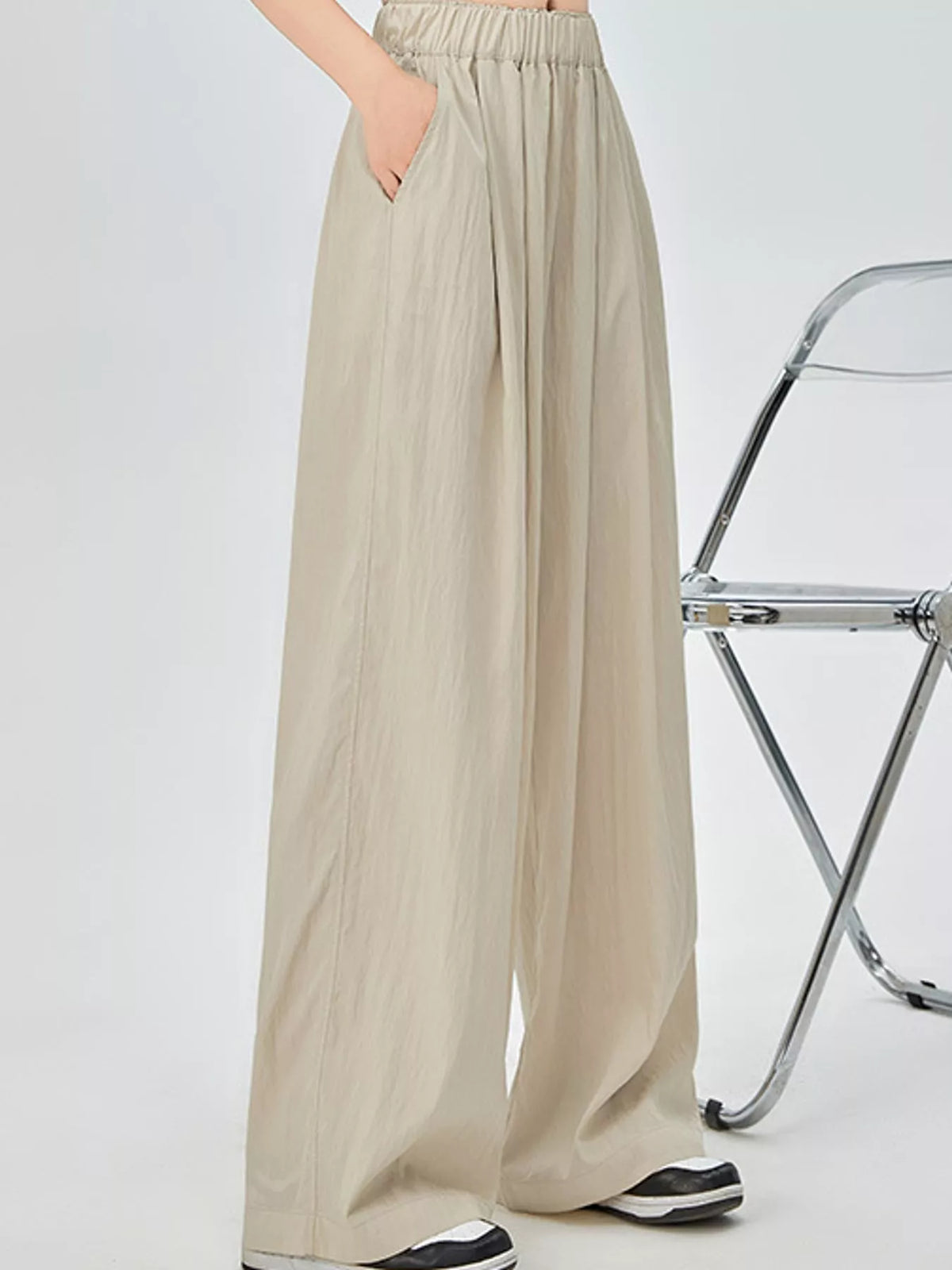 Women's High-Waisted Loose Fit Wide-Leg Casual Pants in beige — side view