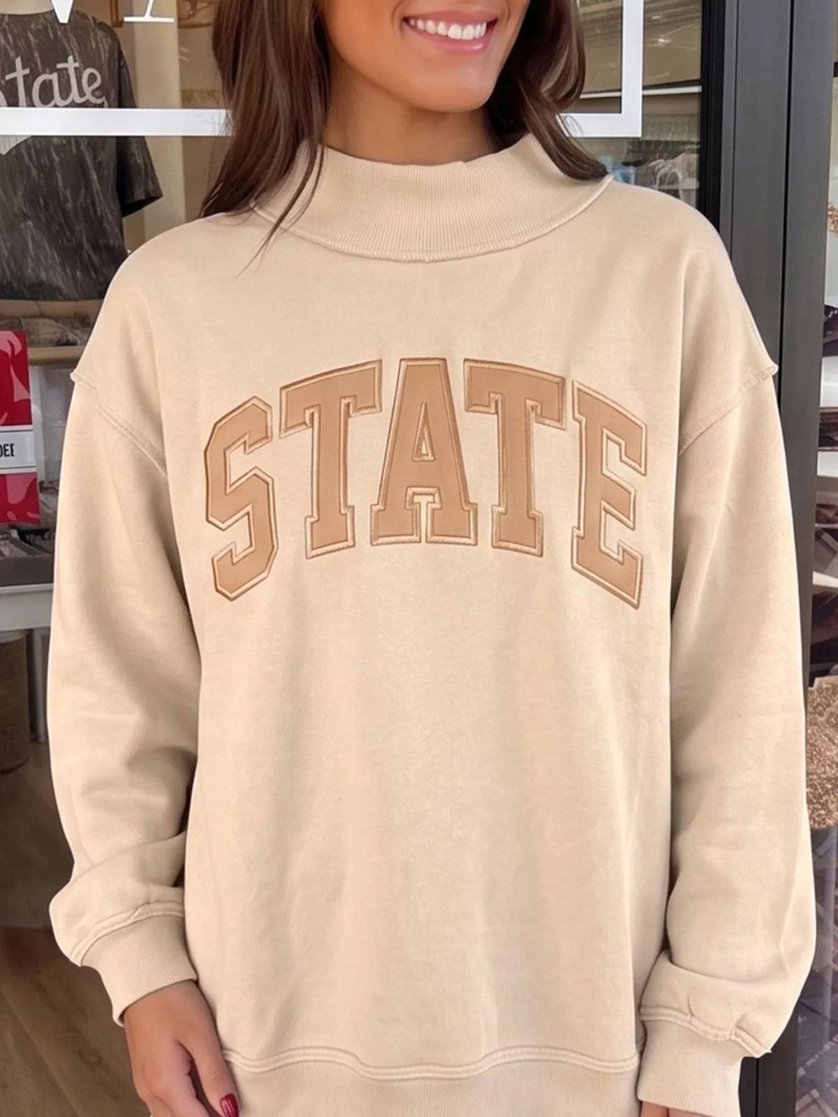 STATE Graphic Exposed Seam Mock Neck Sweatshirt — front view