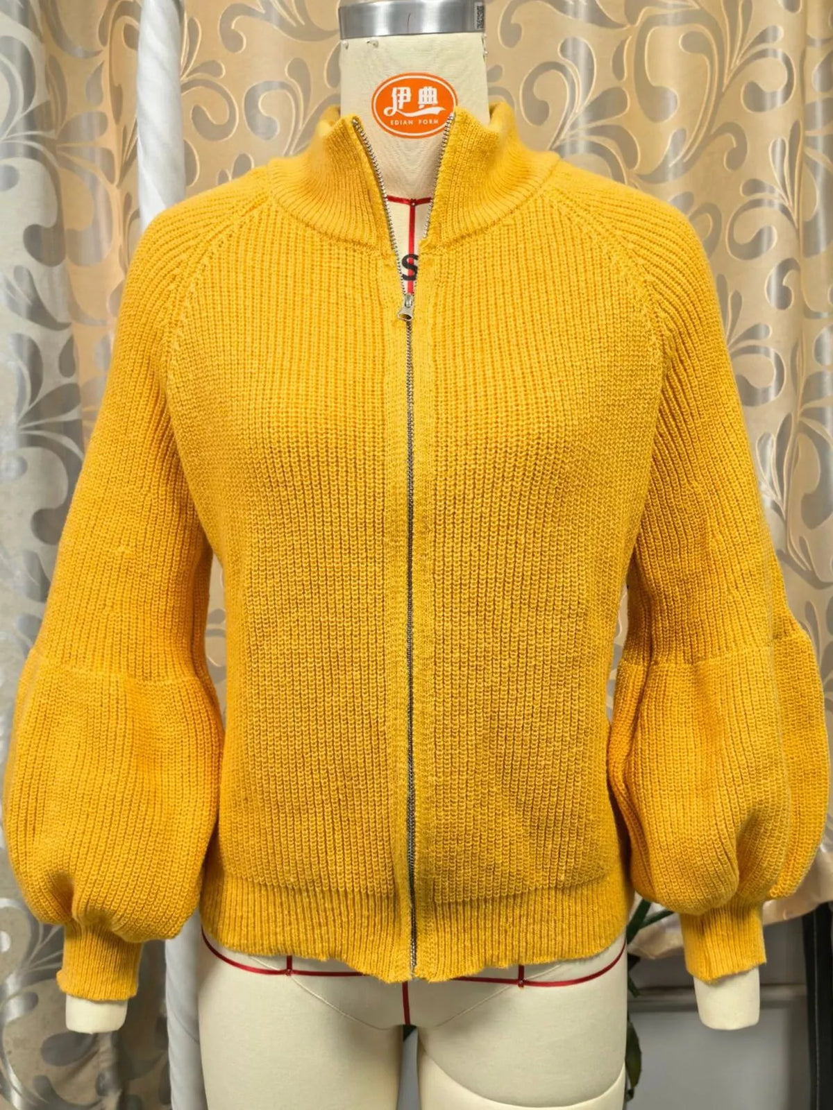 Yellow ribbed knit zip-up lantern sleeve cardigan