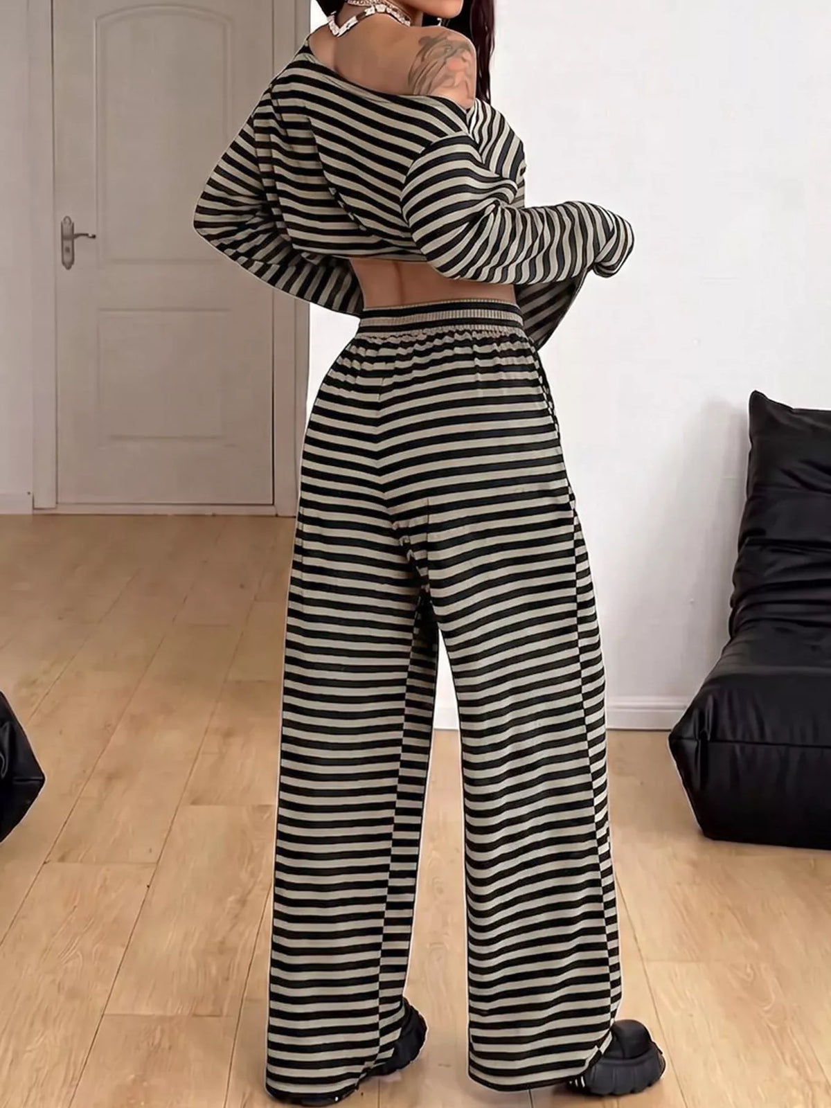 Off-Shoulder Striped Long Sleeve Top and Wide Leg Pants Set, back view in black and cream