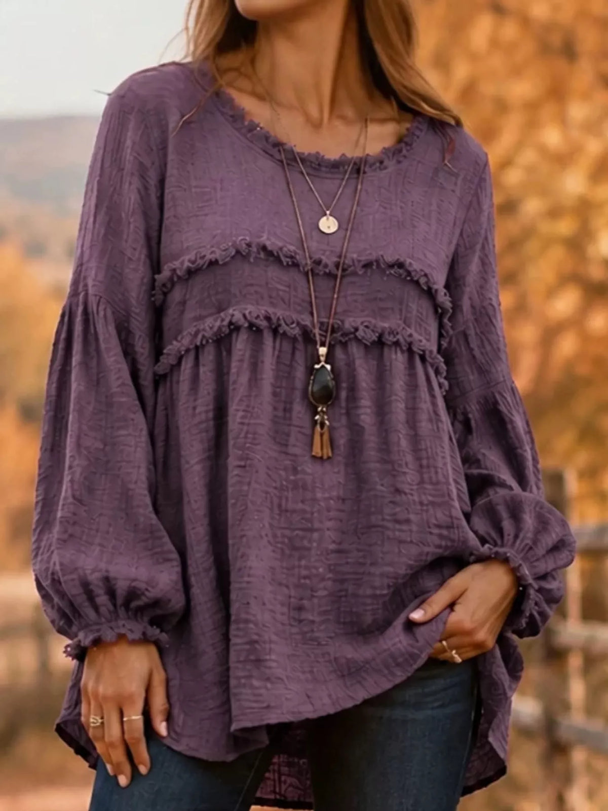 Purple textured frayed-trim peplum blouse