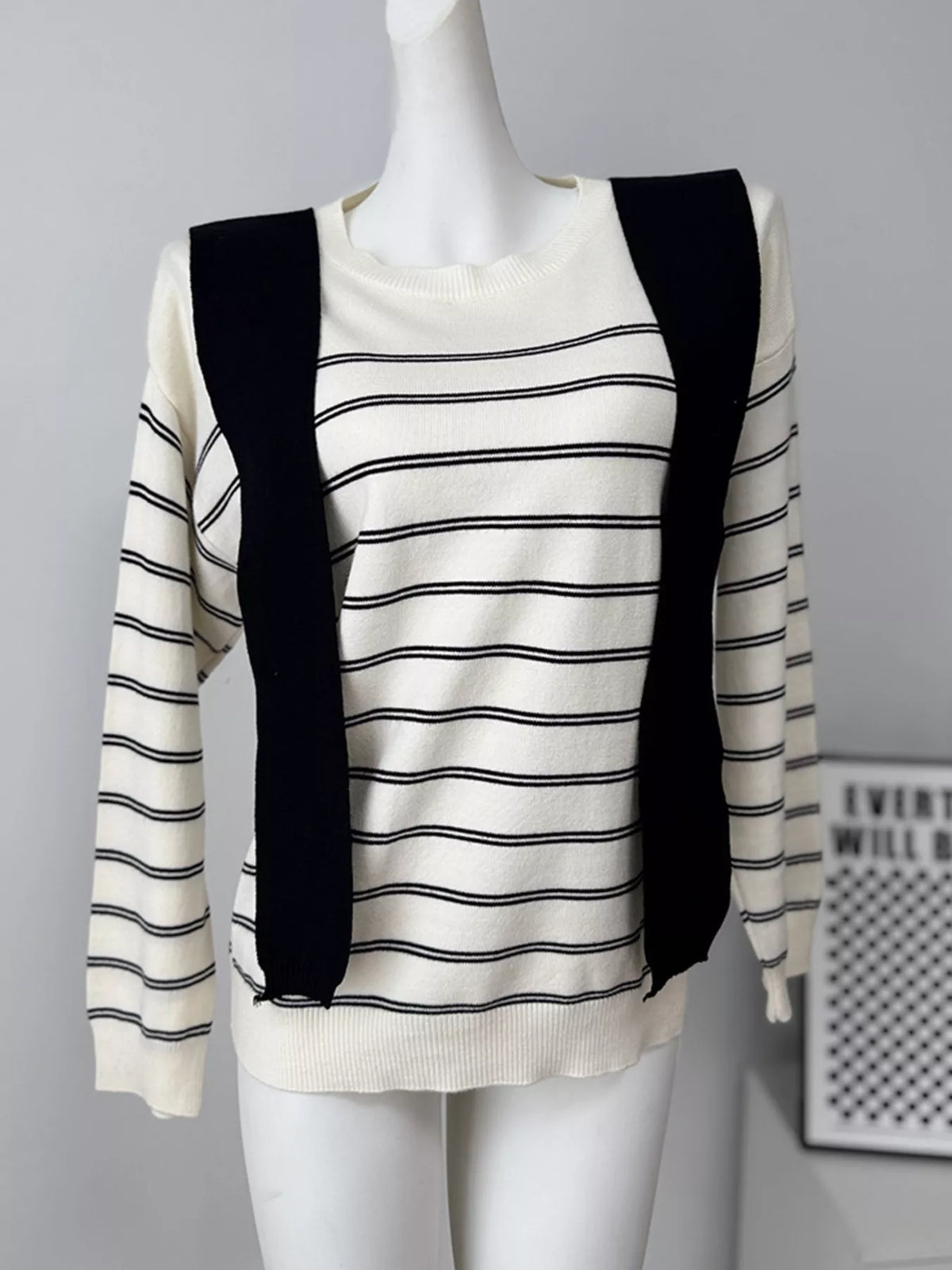 Striped crewneck sweater with layered tie detail in white and black, front with ties loose