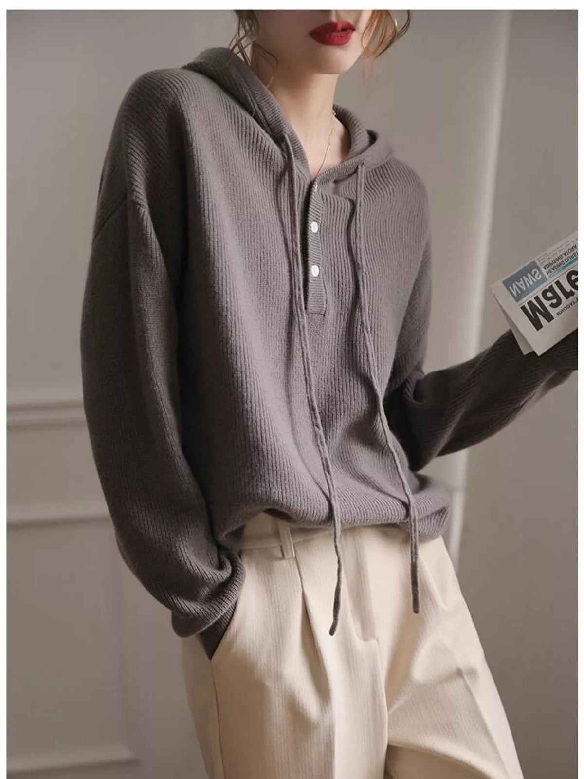 Hooded long sleeve sweater, front view on model