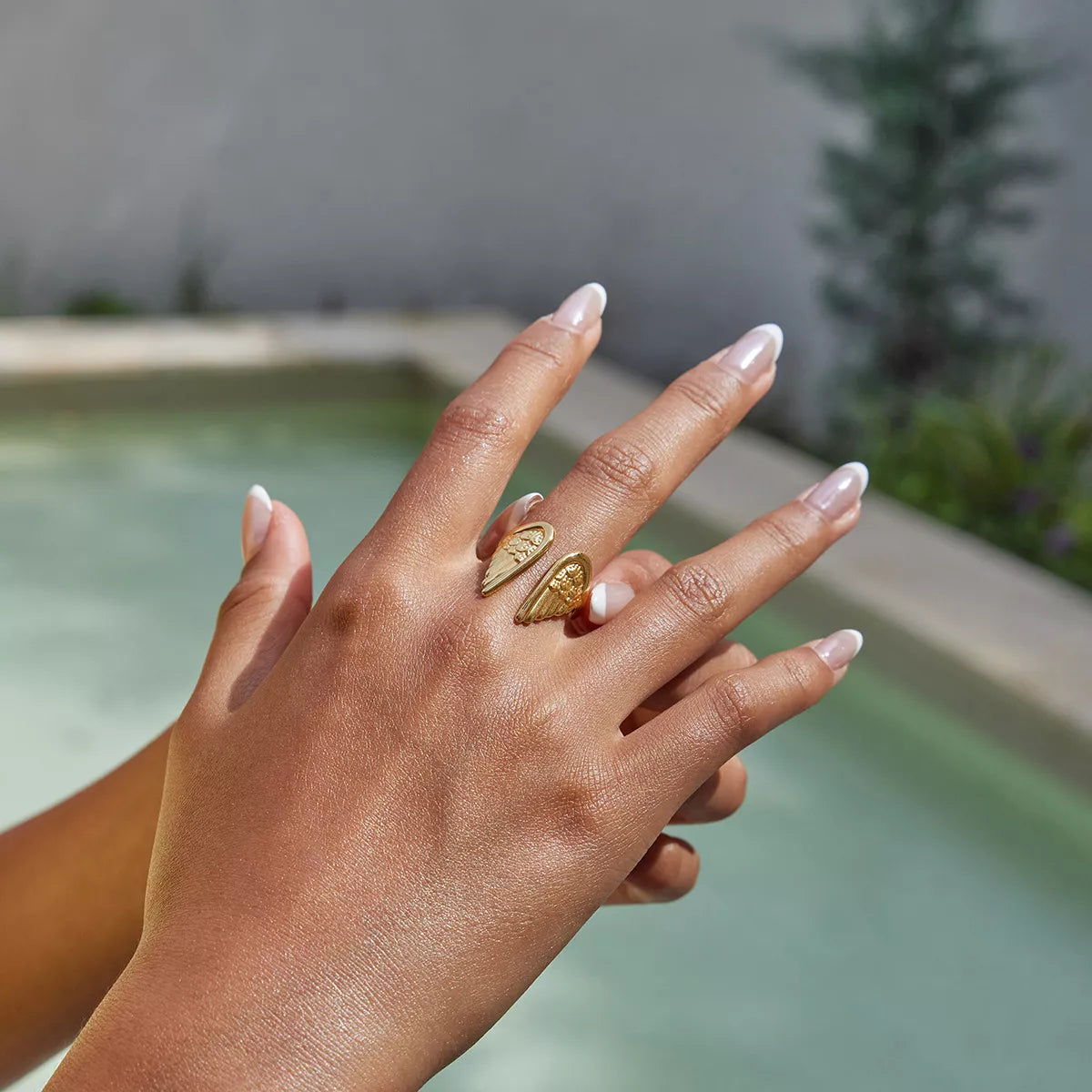 Open Wing Ring, shown worn