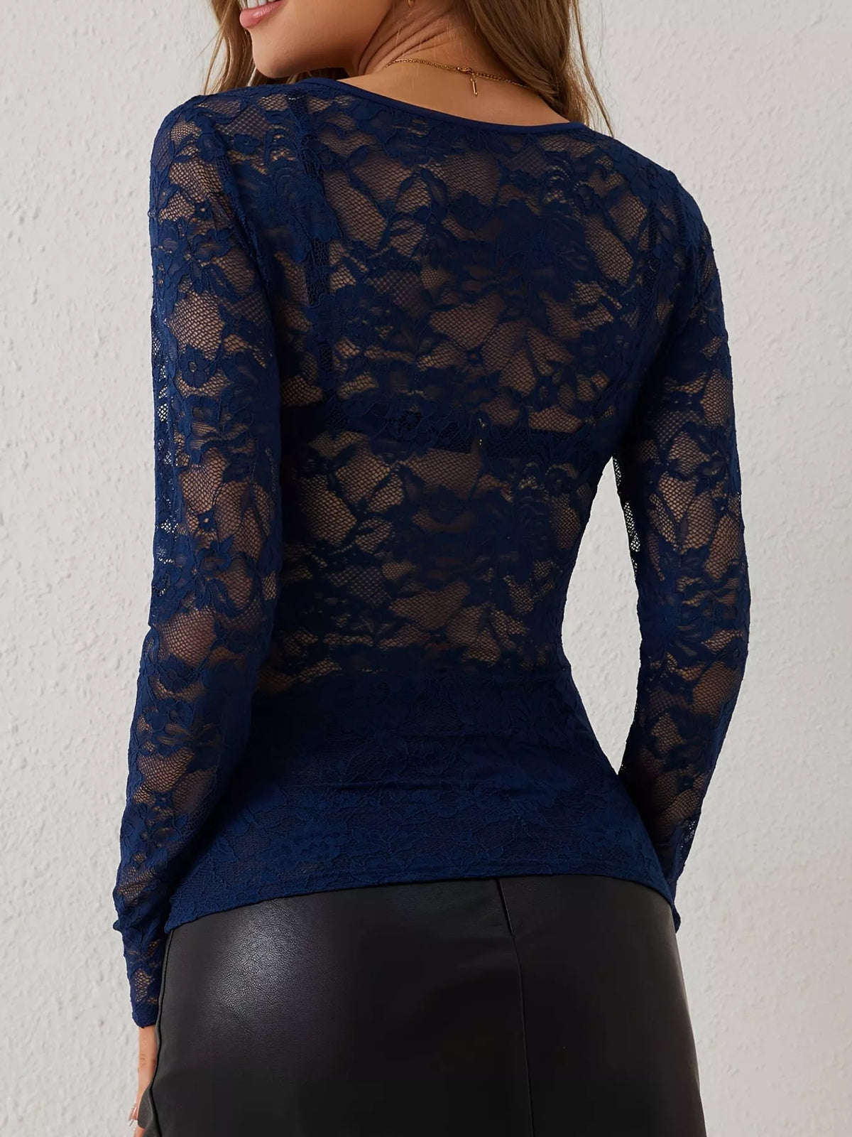 Navy sheer floral lace long sleeve top with scalloped V-neck, back view