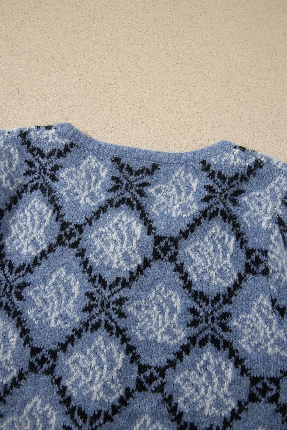 Blue geometric short sleeve cardigan, back neckline