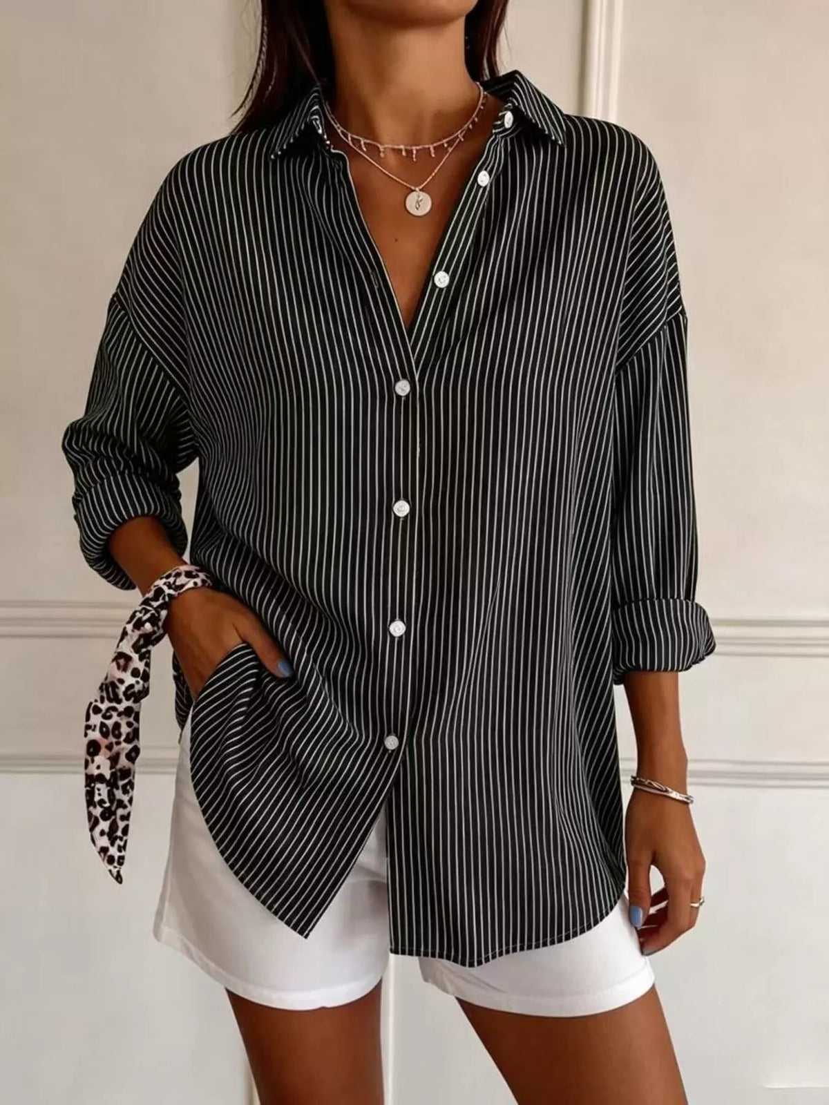 Black striped long sleeve shirt, button-front and rolled sleeves