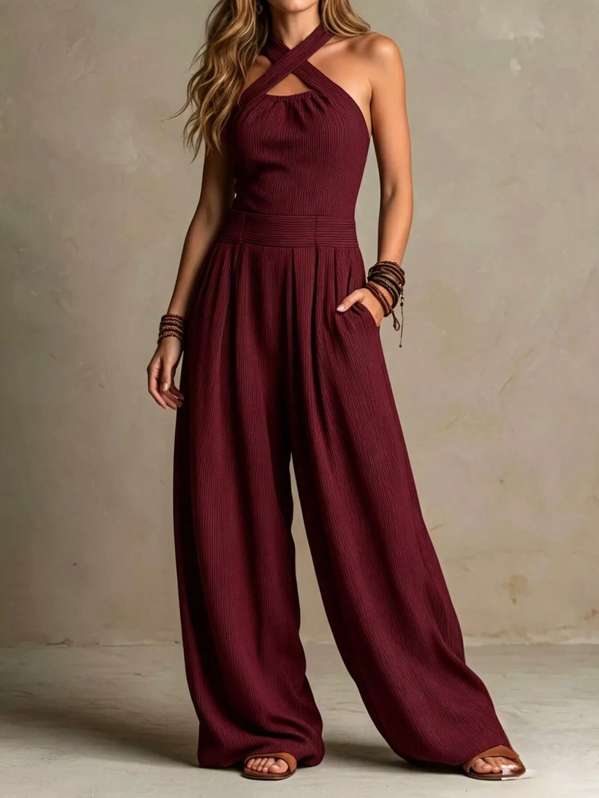 Burgundy halter-neck wide-leg jumpsuit, front view