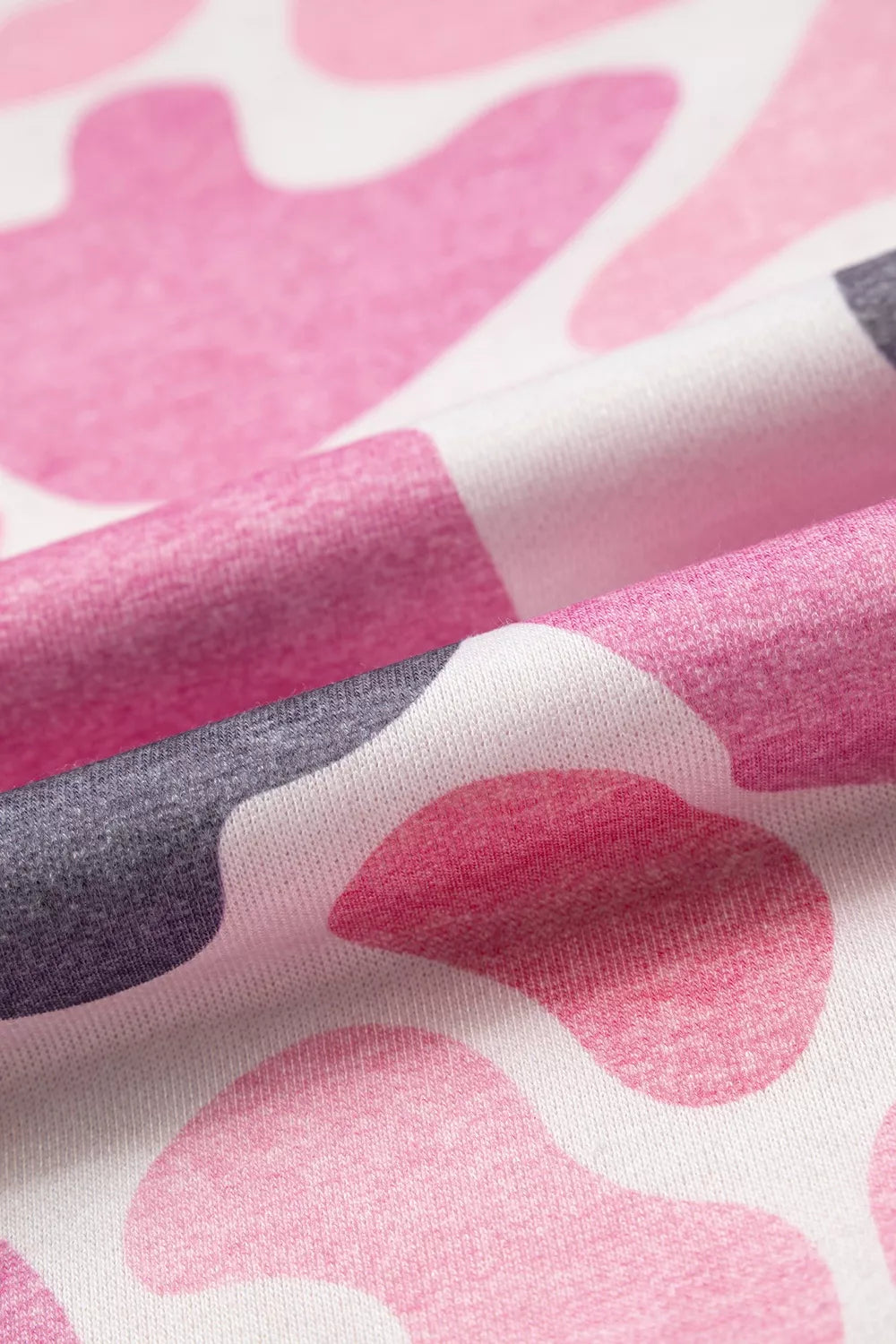 Pink camouflage Howdy sweatshirt, fabric print close-up