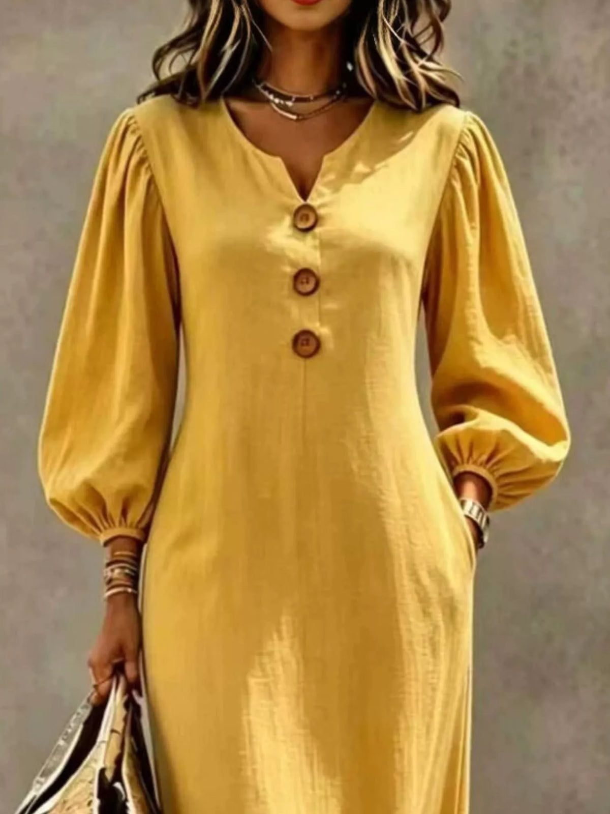 Yellow balloon-sleeve maxi dress, neckline and sleeve detail
