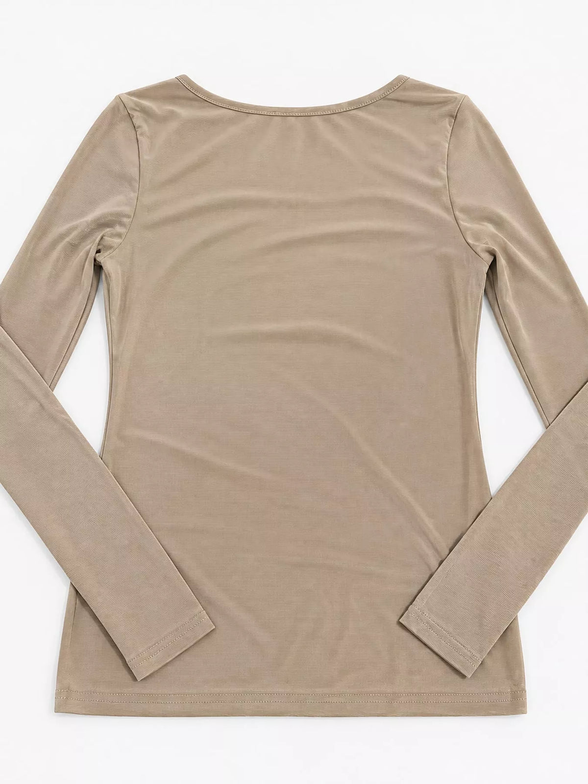 Beige mesh long sleeve top, back laid flat