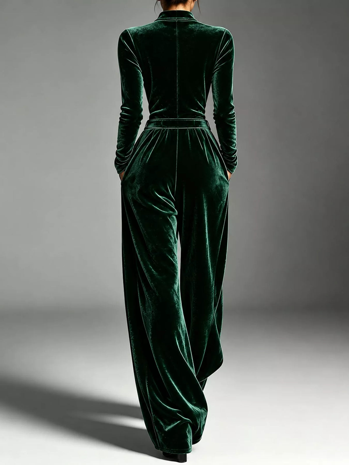 Green velvet zip up jumpsuit with tie waist, back view