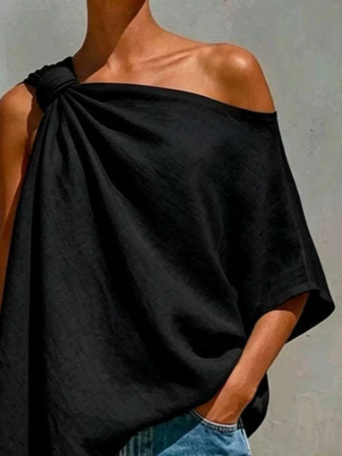 One-Shoulder Knot Detail Blouse in black, front view