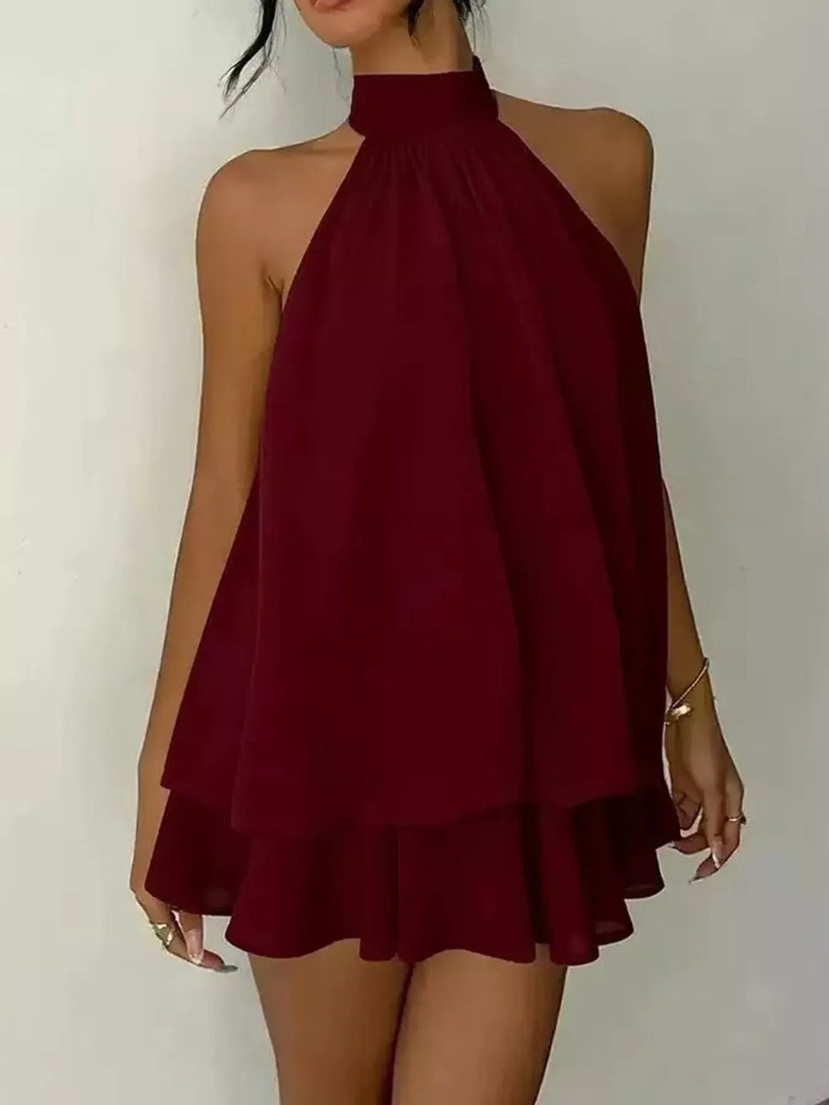 Burgundy halter neck layered mini dress, front view
