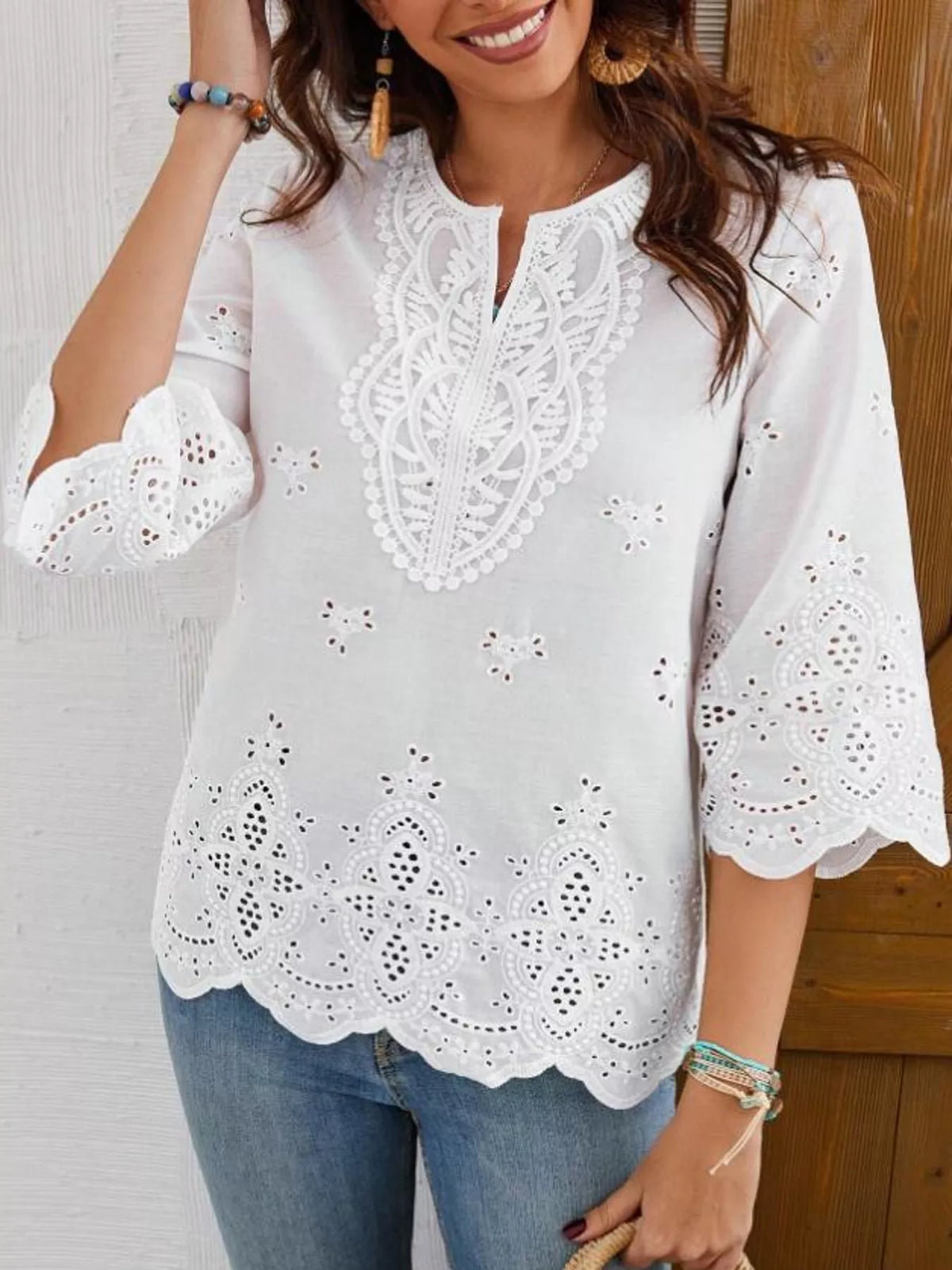 White eyelet embroidered v-neck blouse