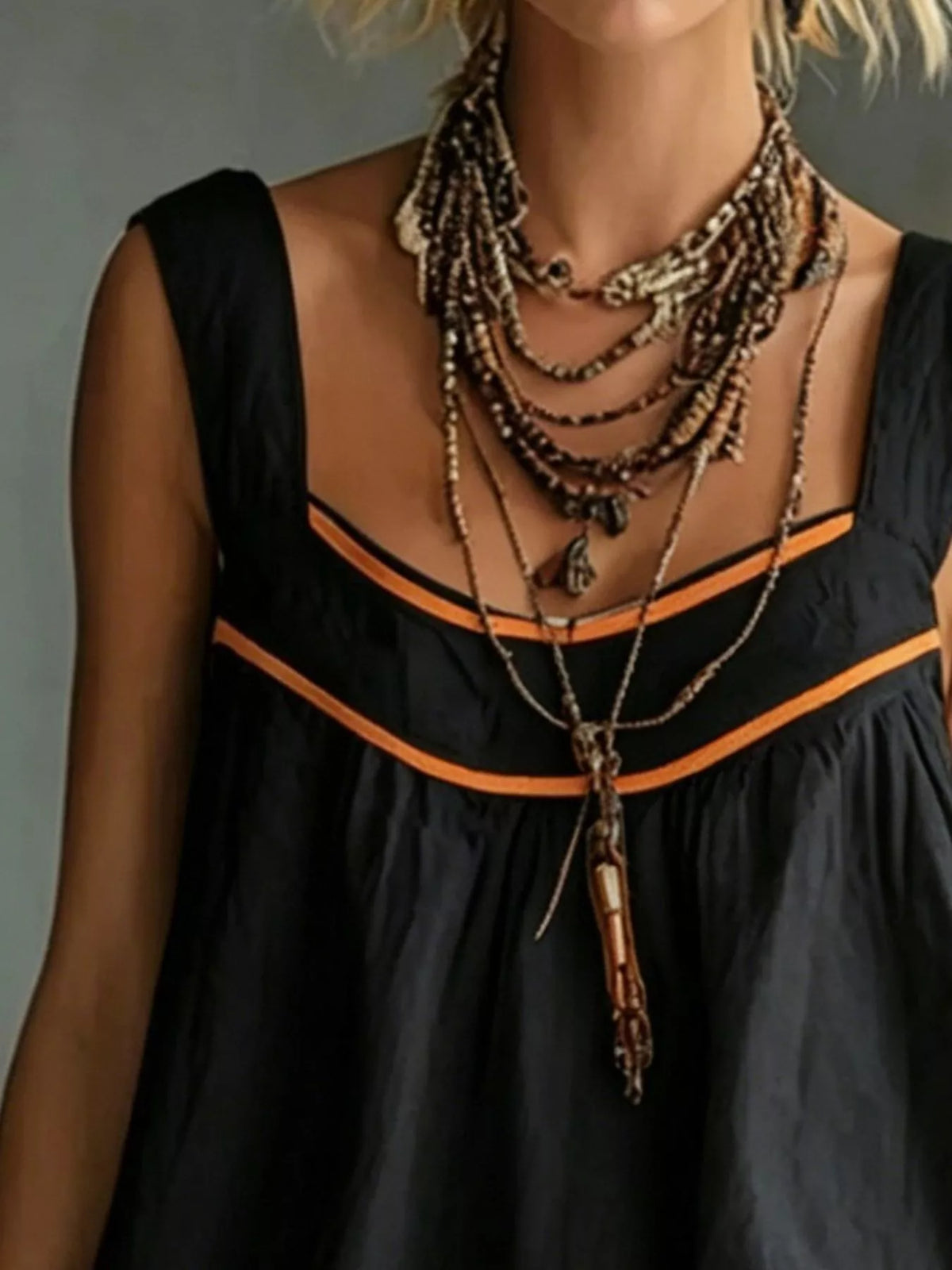 Sleeveless Tiered Mini Dress in black, bodice detail