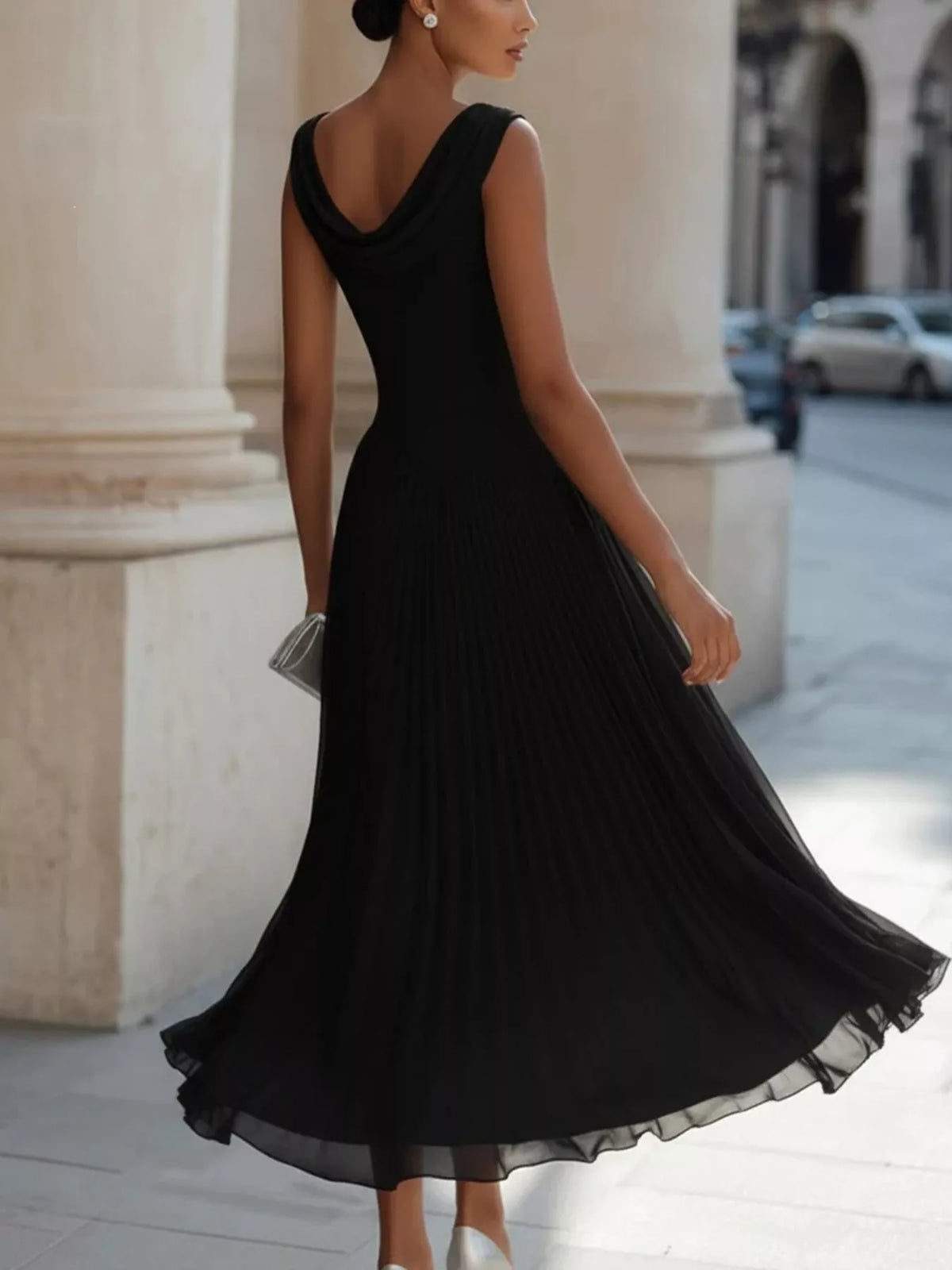 Black sleeveless boat neck midi dress — back view