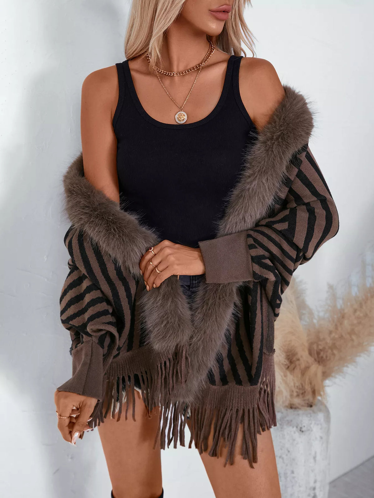 Faux Fur Trimmed Striped Knit Fringe Poncho in brown and black