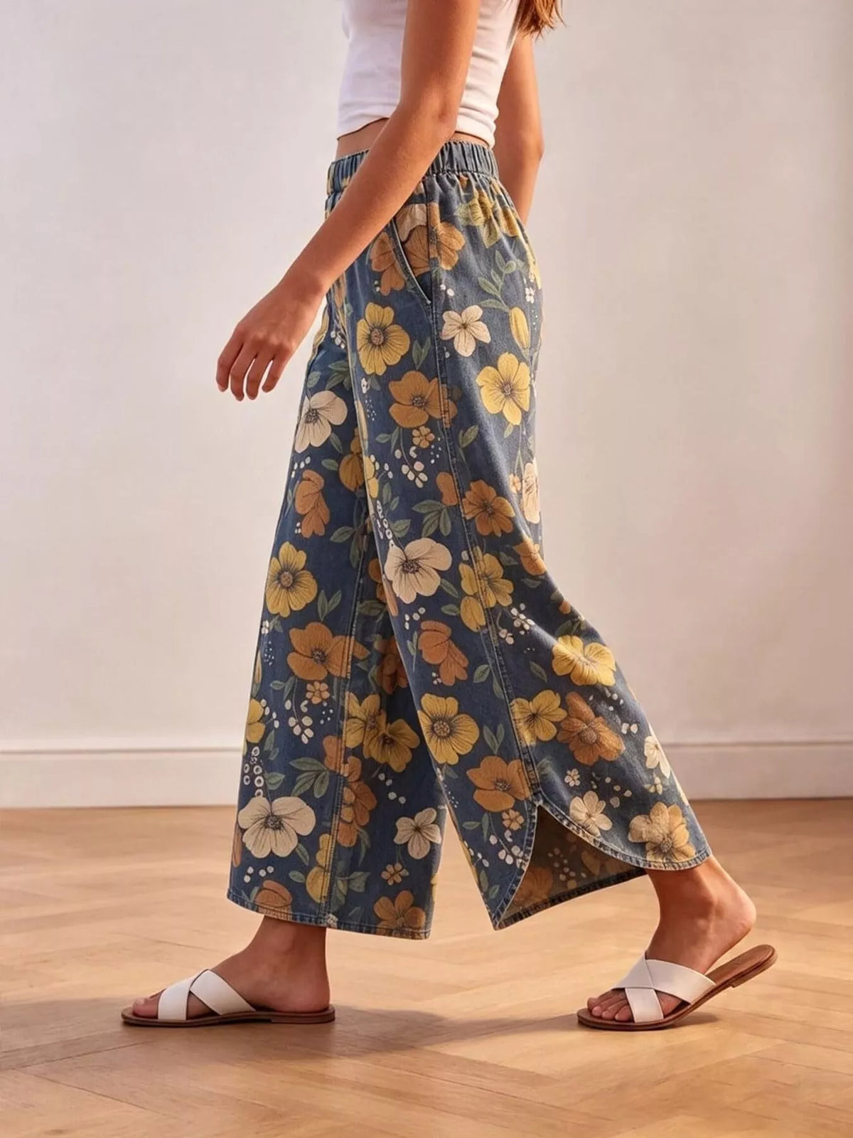 Blue floral wide-leg pants with elastic waist, side view