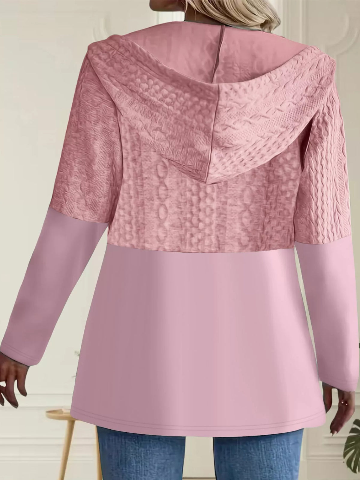 Pink hooded zip-up jacket, back view