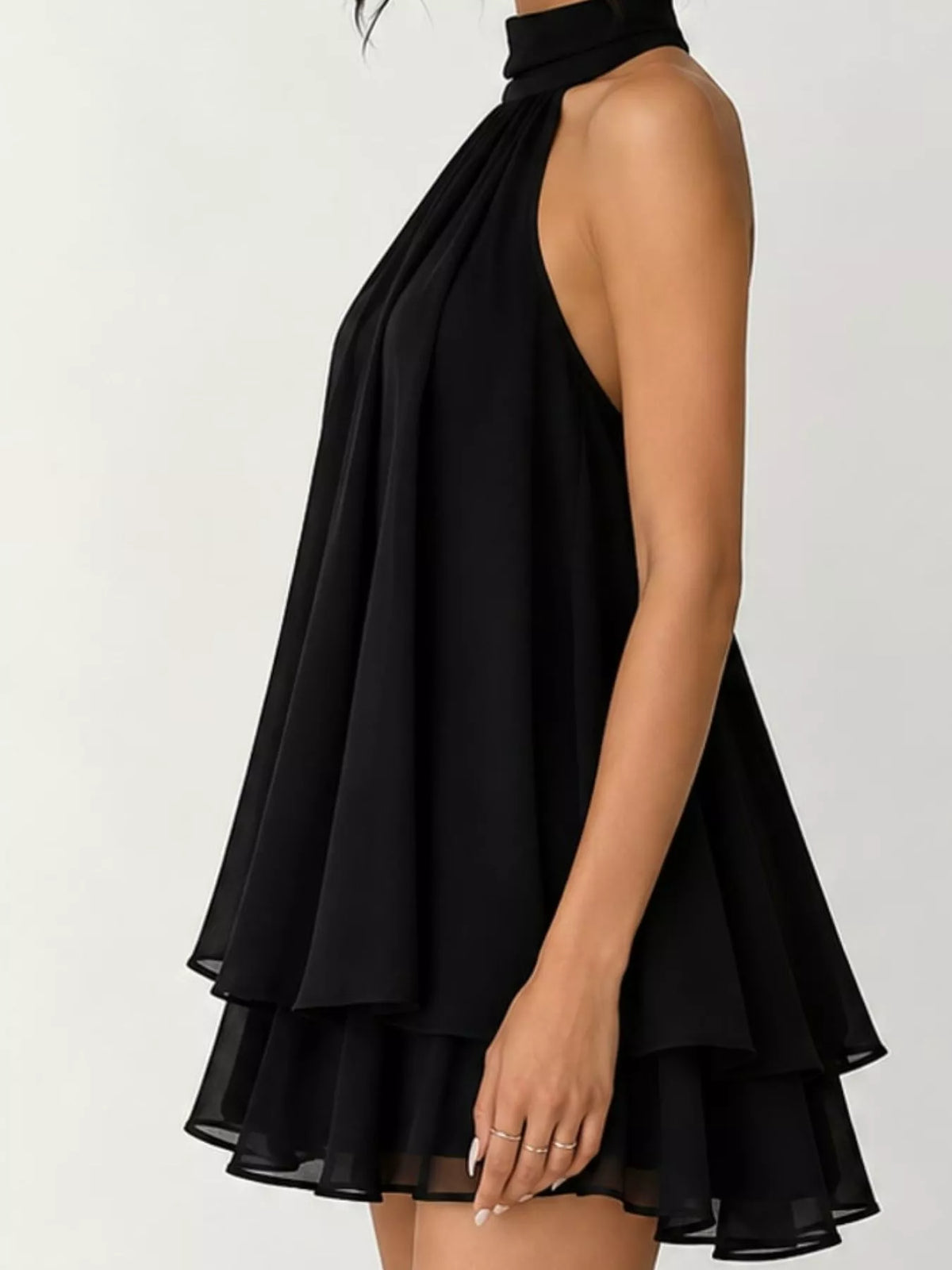Black halter neck chiffon mini dress, side view