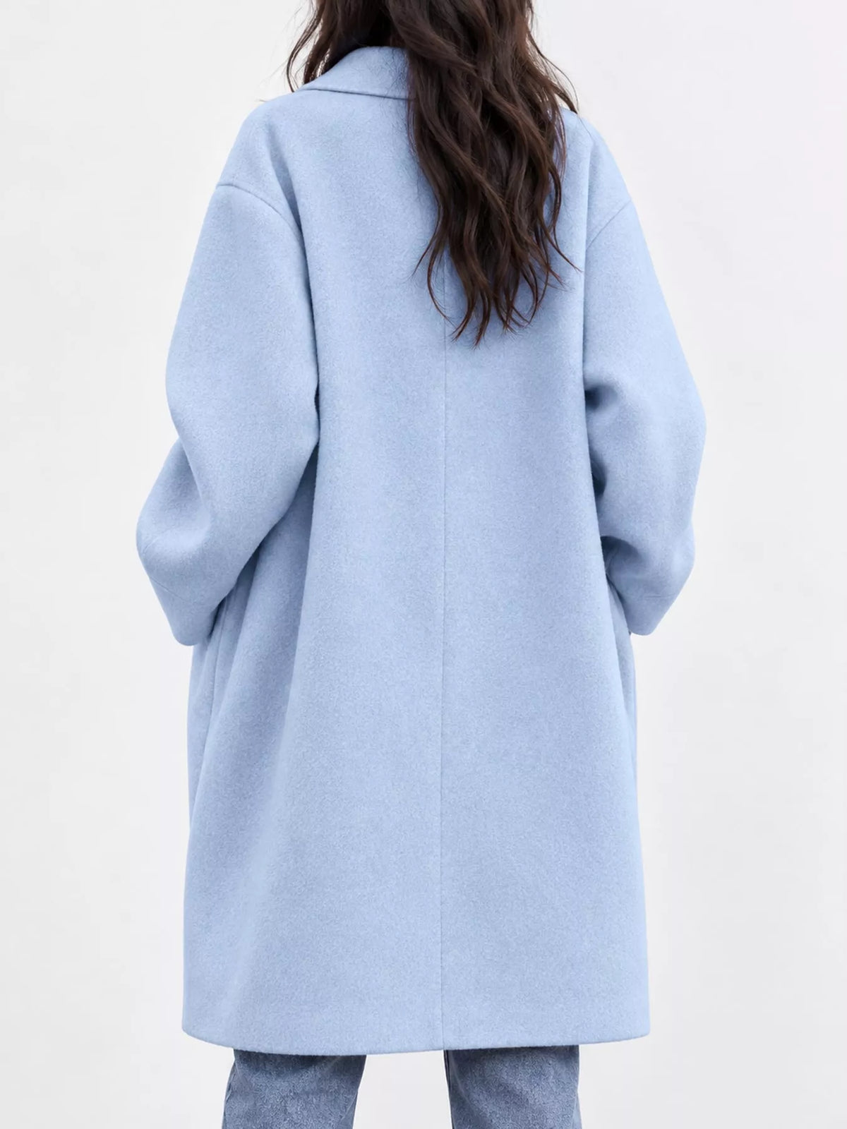 Light blue lapel collar one button coat, back view
