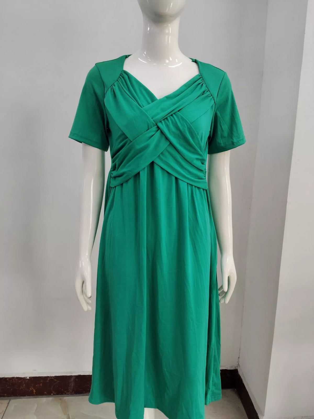 Green crisscross short sleeve midi dress, front view