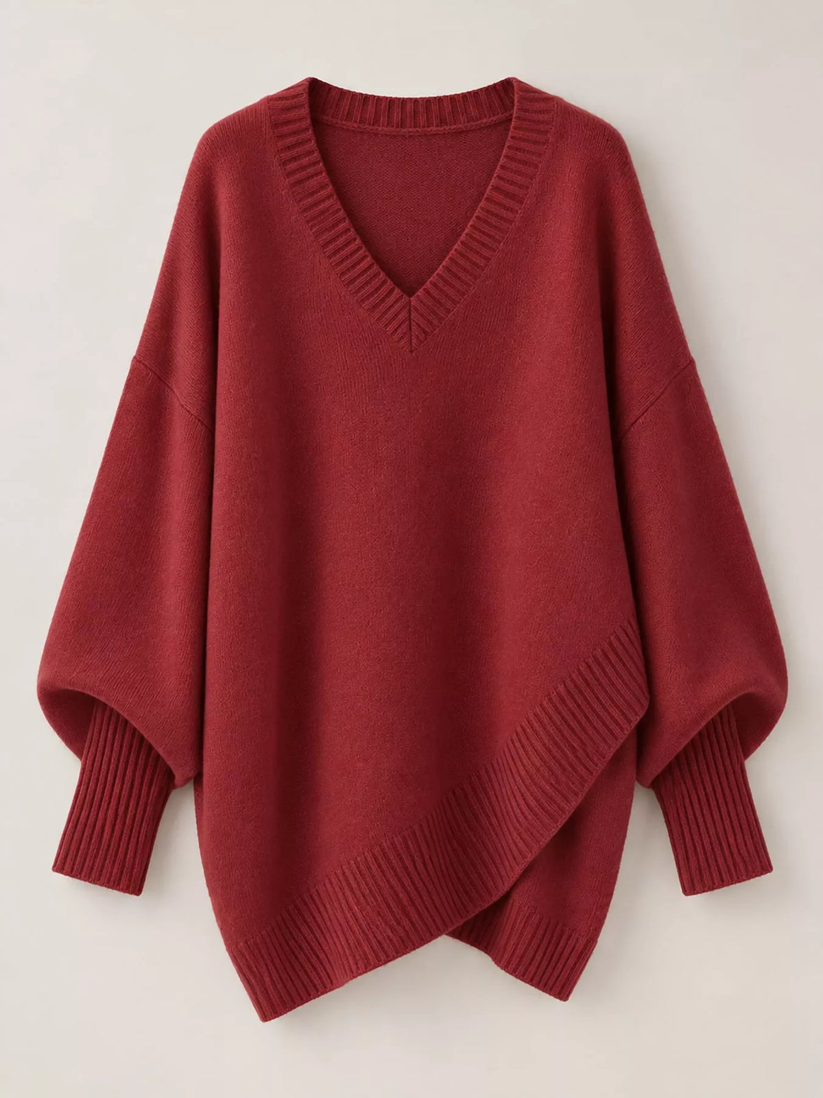 Batwing sweater, red flat lay